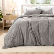Relaxing room scene with a duvet cover laid out over the bed