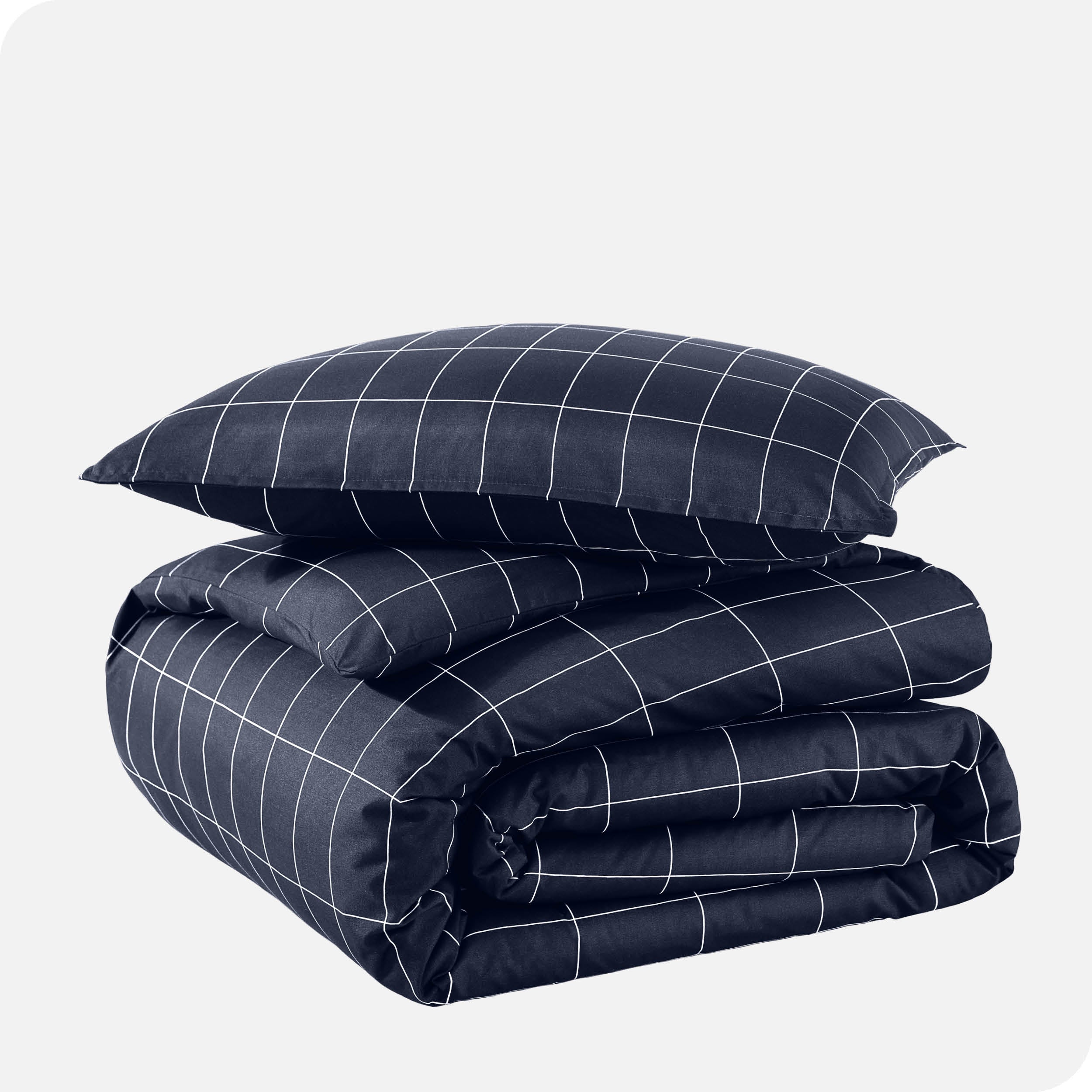 A duvet cover set folded and stacked.
