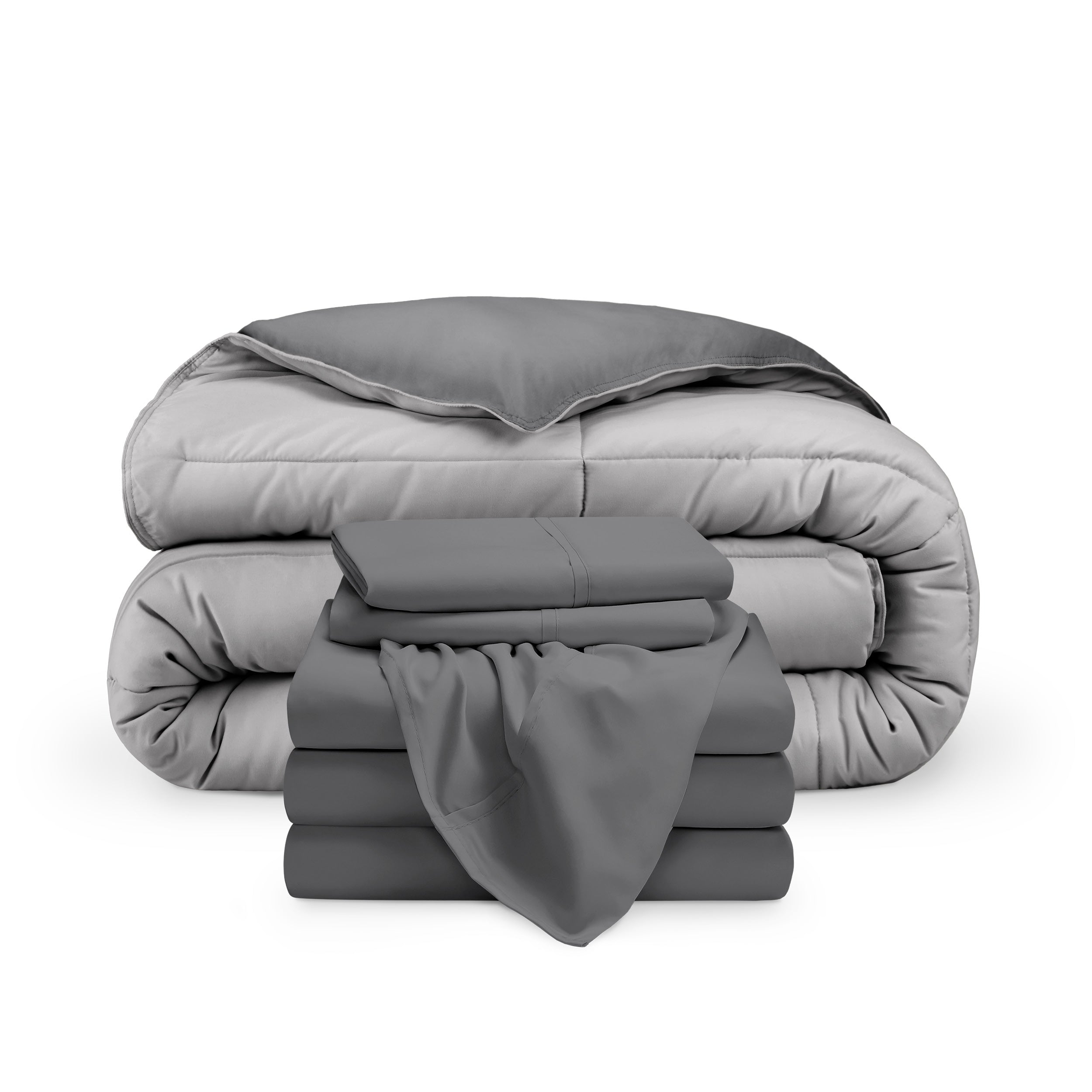 A reversible microfiber comforter and a coordinating sheet set folded and stacked