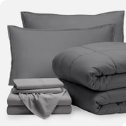 A bed in a bag folded and stacked neatly
