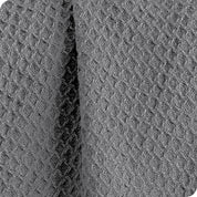 Close up of the texture of the waffle blanket
