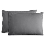 2 pillows with flannel pillowcases on them