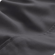 Close-up of the fabric and its neatly finished edge.