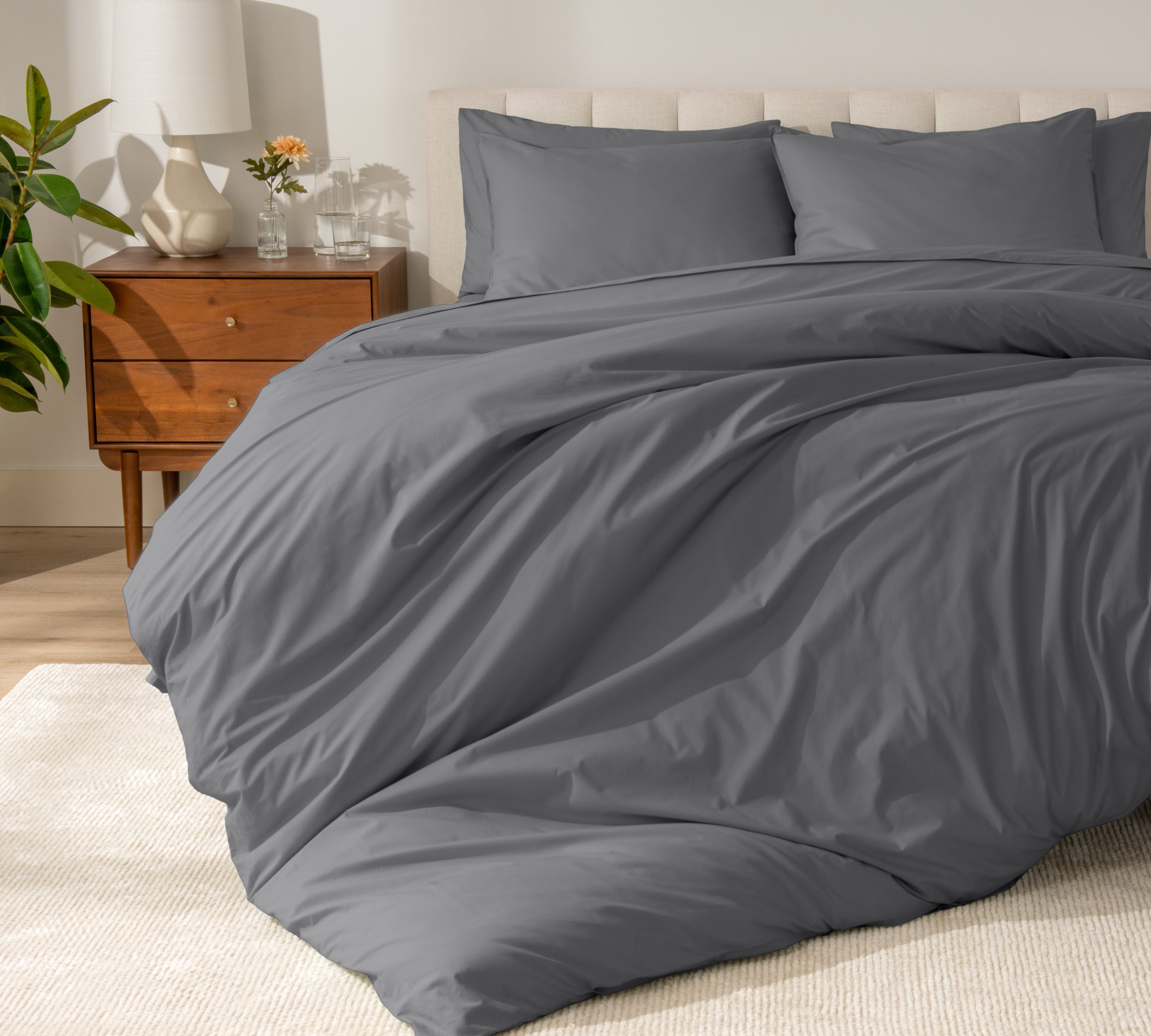 A modern bed with a organic cotton percale duvet cover on.