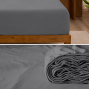 A divided image showing both the corner of a bed with organic jersey sheet and the folded sheet stacked on the bed.
