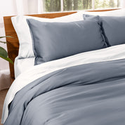Matching TENCEL™ duvet cover and pillow shams on a bed