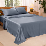 TENCEL™ sheet set on a bed. The flat sheet is draped over the side and end of the bed.