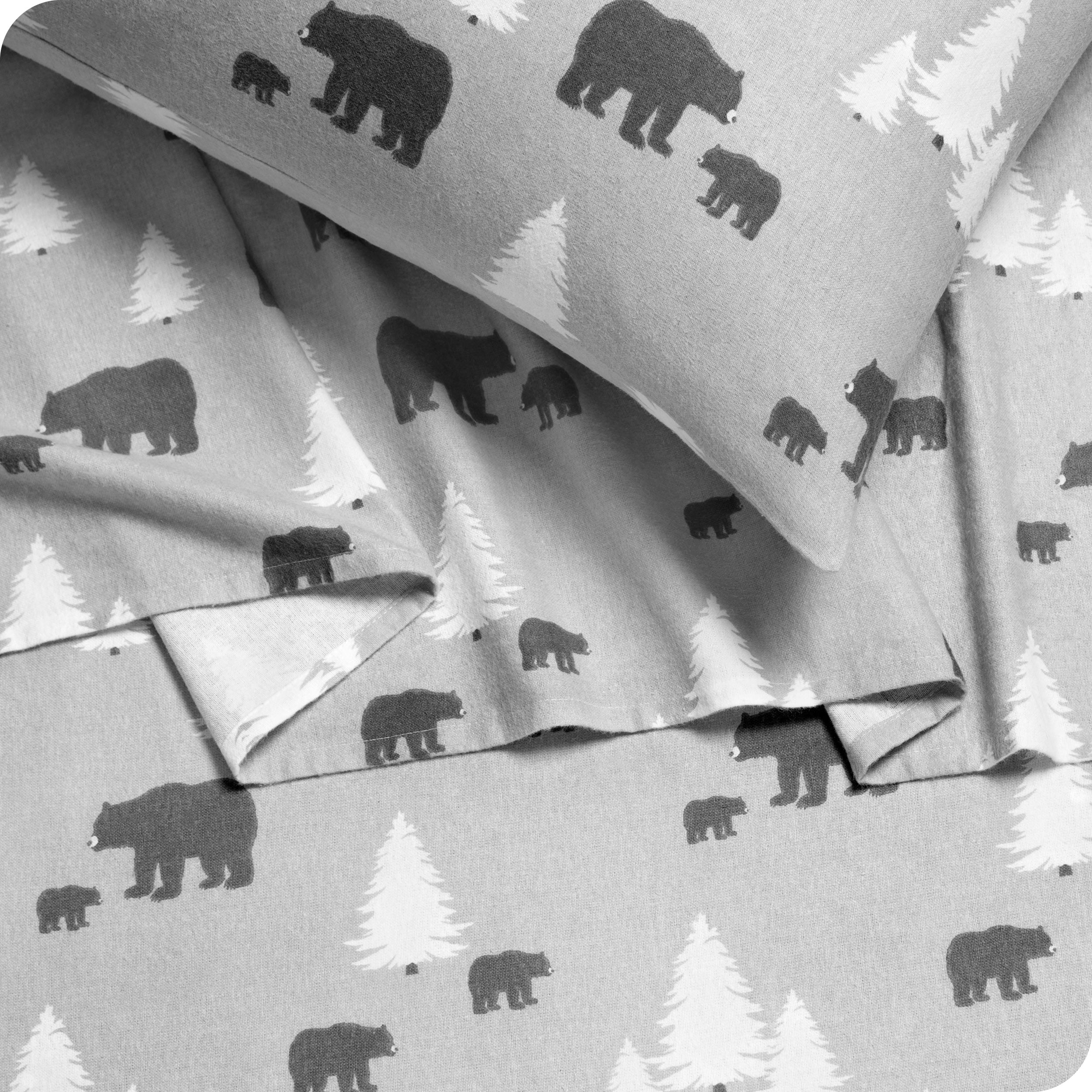 Close up of a printed flannel pillowcase and matching sheets