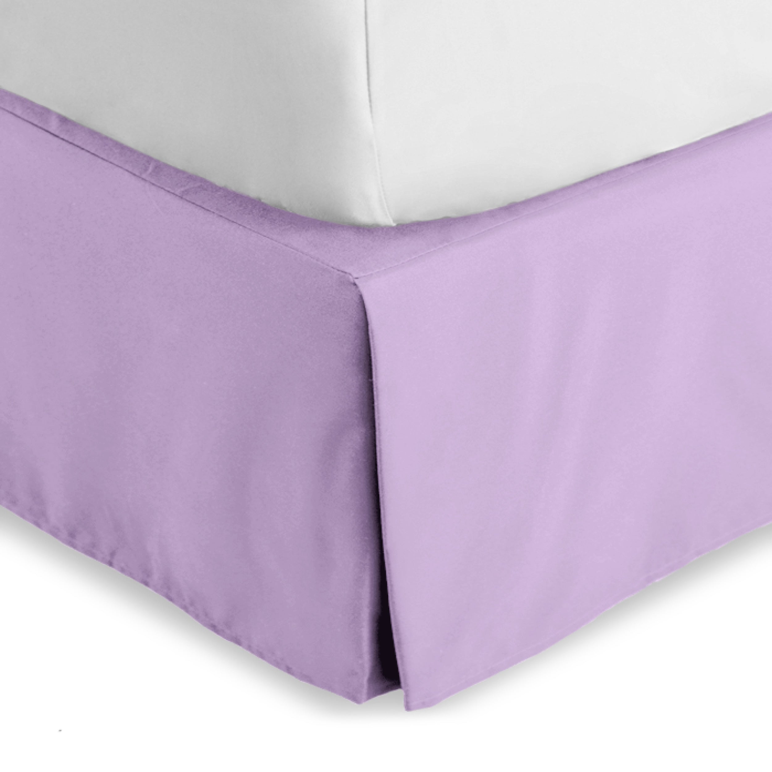 The corner of a bed skirt on a bed frame