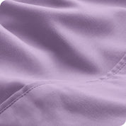 Close-up of the fabric and its neatly finished edge.