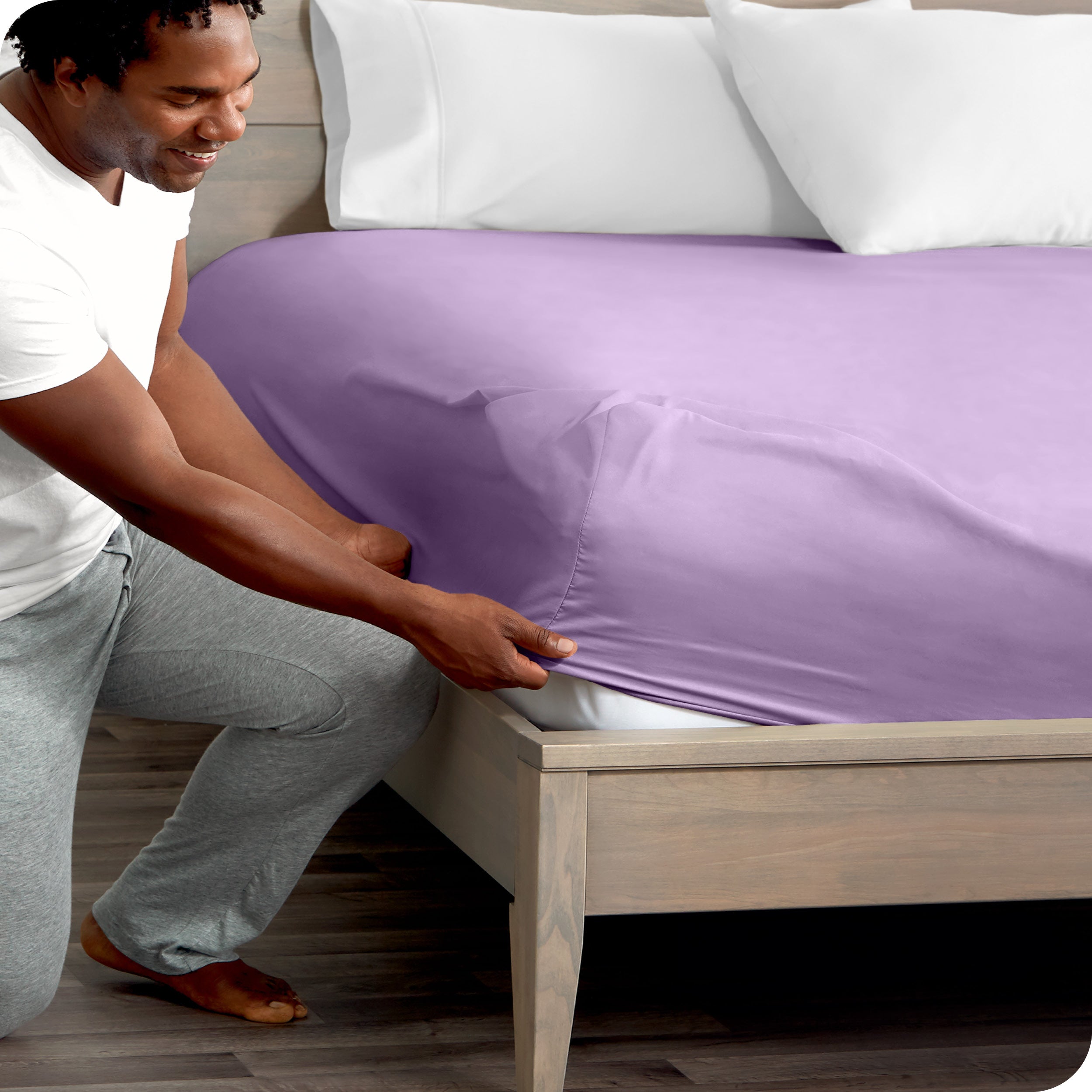 A close up of the elastic of a microfiber fitted sheet.
