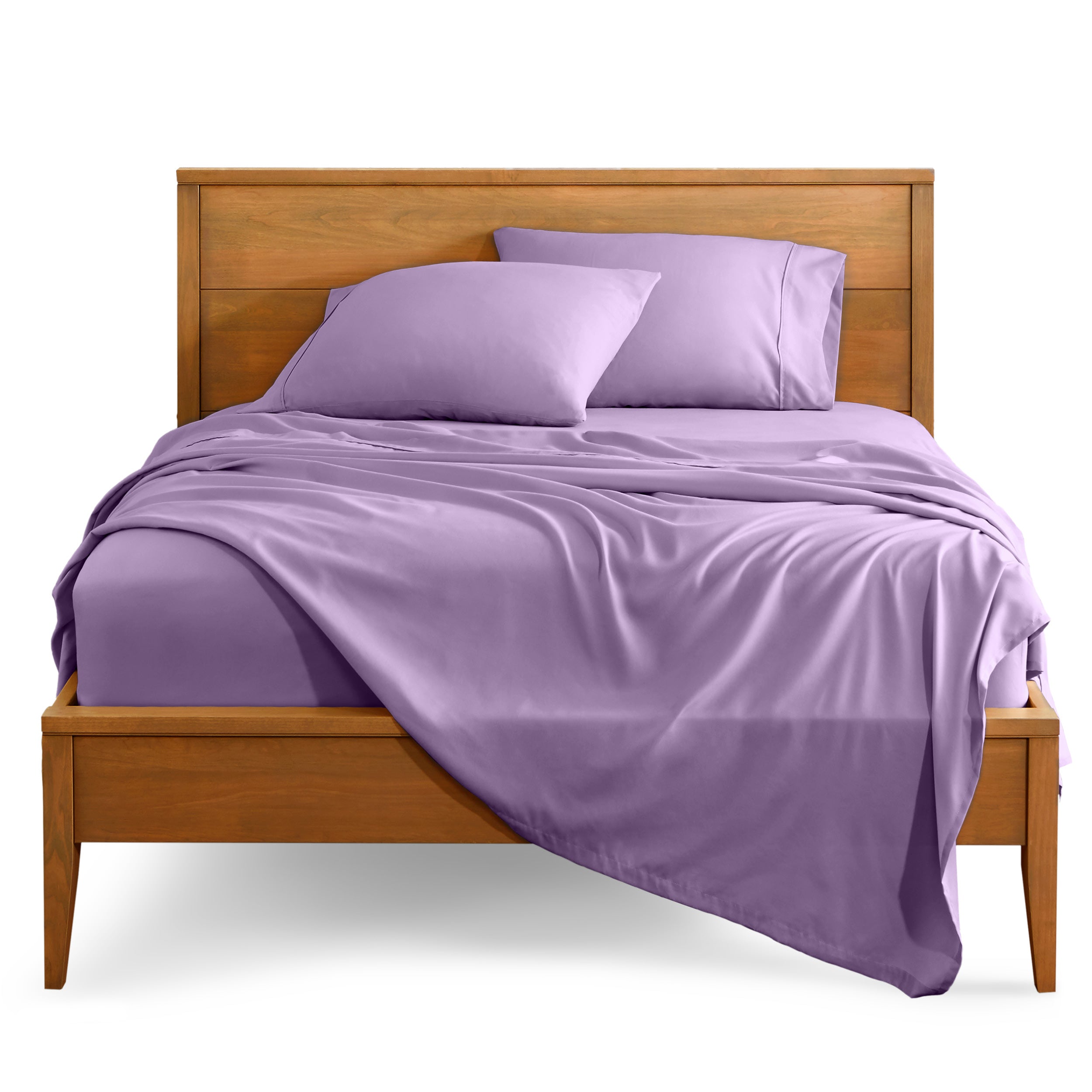 Microfiber sheet set on a bed with a wooden bed frame