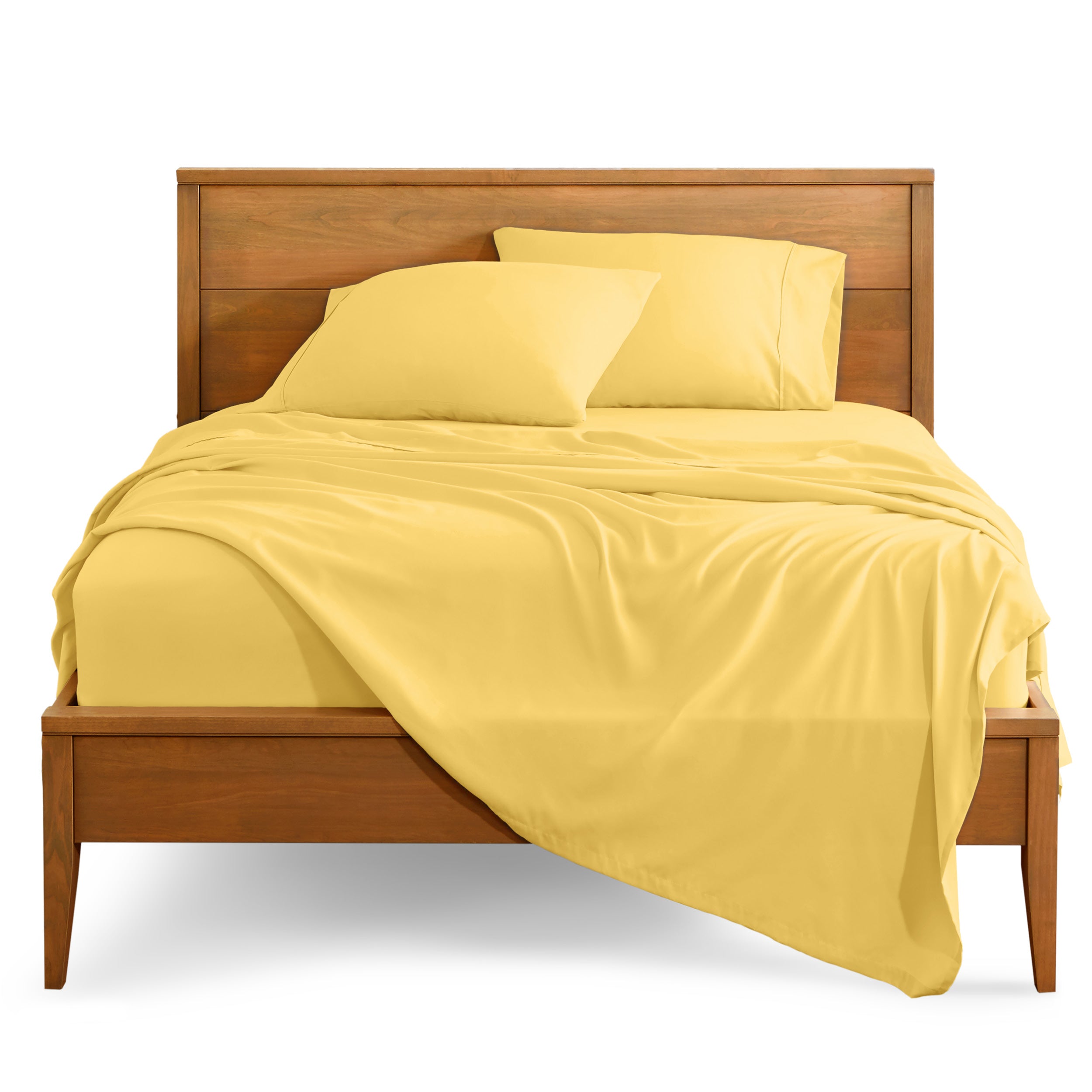 Microfiber sheet set on a bed with a wooden bed frame