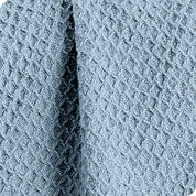 Close up of the texture of the waffle blanket