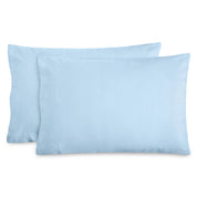 2 pillows with flannel pillowcases on them
