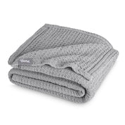 A cotton waffle blanket folded