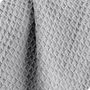 Close up of the texture of the waffle blanket