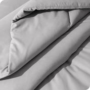 A close up of a track stitch comforter