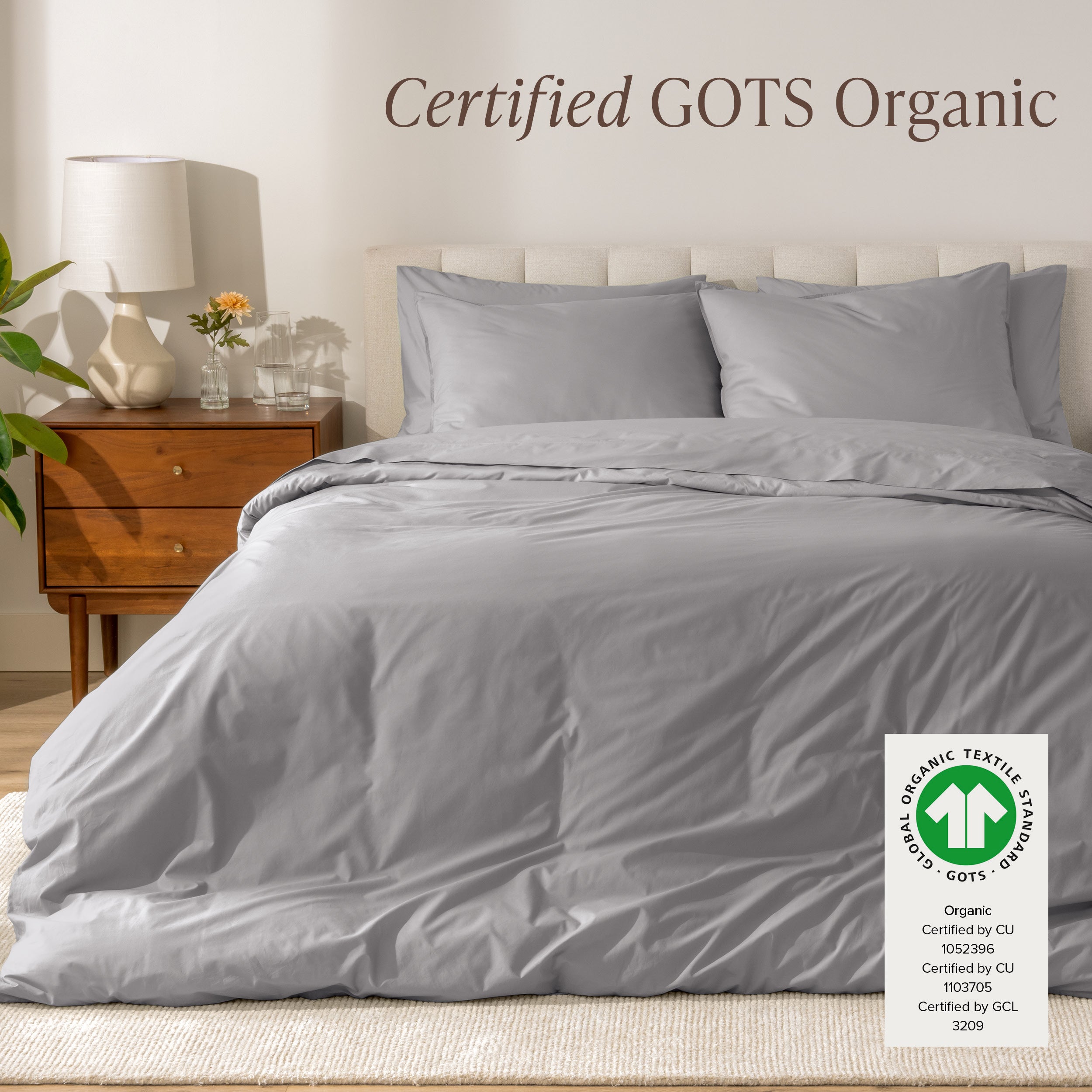A modern bed with a organic cotton percale duvet cover on, it's Certified GOTS Organic.