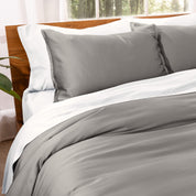 Matching TENCEL™ duvet cover and pillow shams on a bed