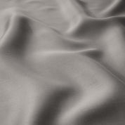 Close up of the corner ties on a TENCEL™ duvet cover