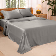 TENCEL™ sheet set on a bed. The flat sheet is draped over the side and end of the bed.