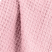 Close up of the texture of the waffle blanket