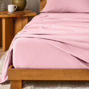 A modern bedroom with cotton flannel sheets on the bed