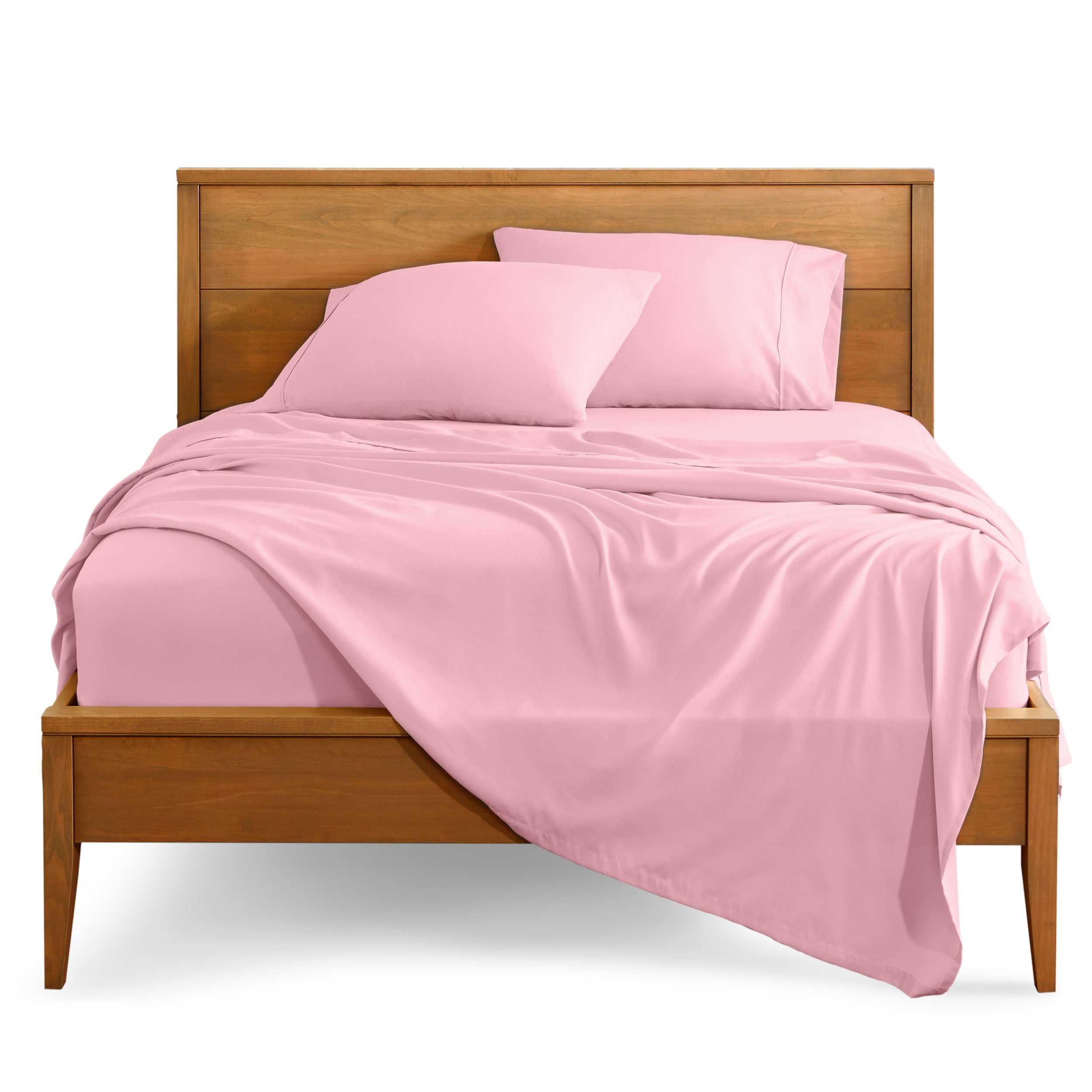 Microfiber sheet set on a bed with a wooden bed frame