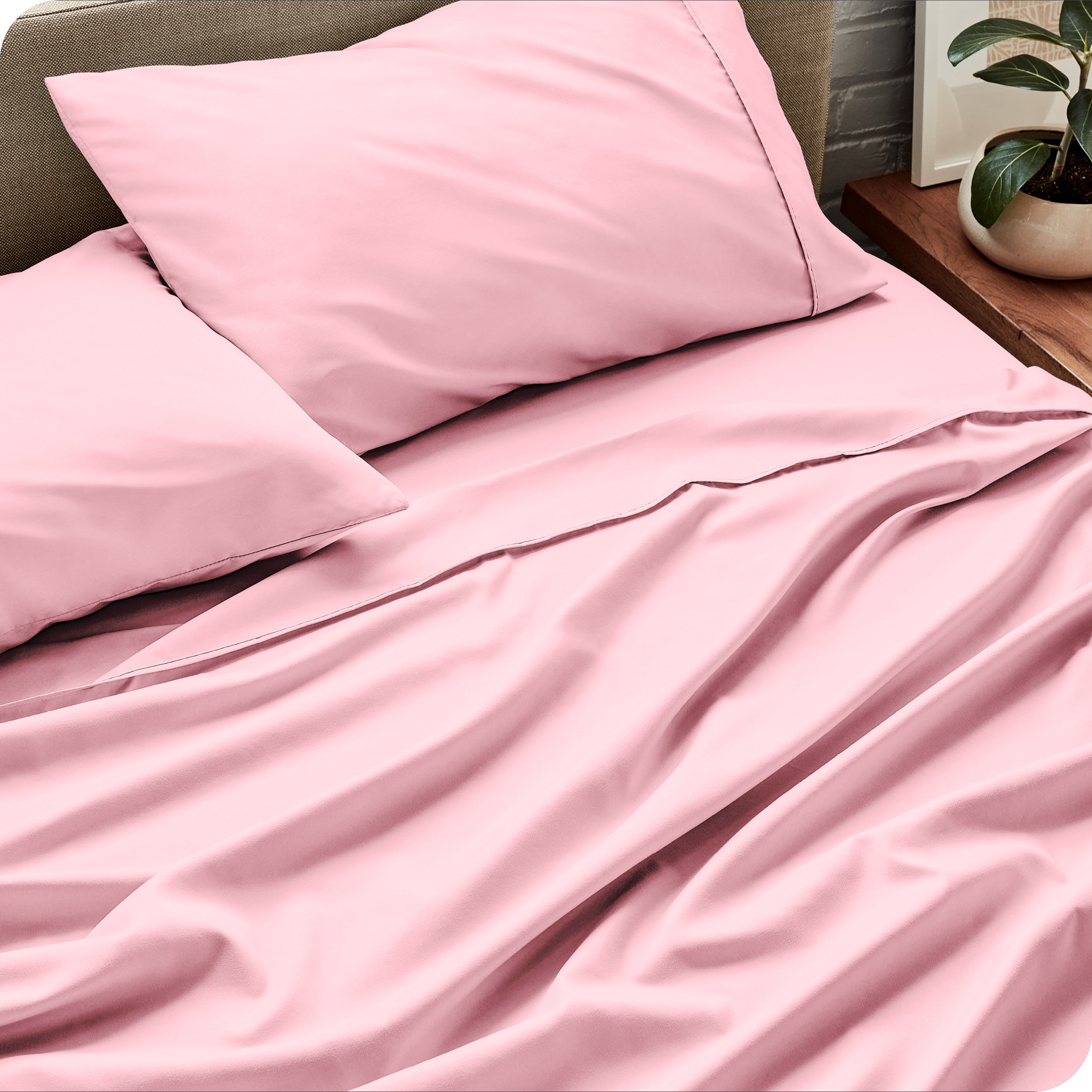 Close up of a microfiber sheet set on a bed