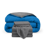 A reversible microfiber comforter and a coordinating sheet set folded and stacked