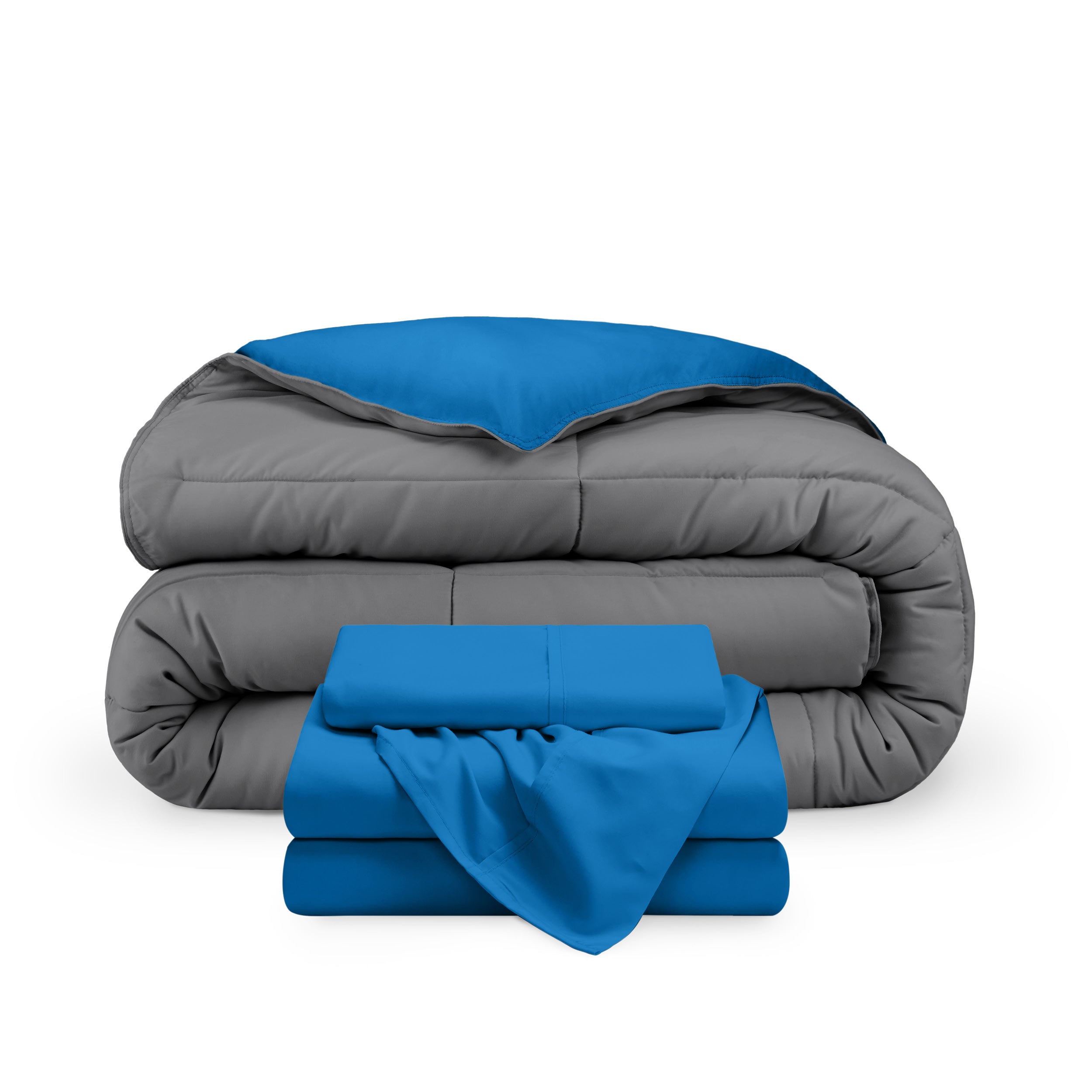A reversible microfiber comforter and a coordinating sheet set folded and stacked