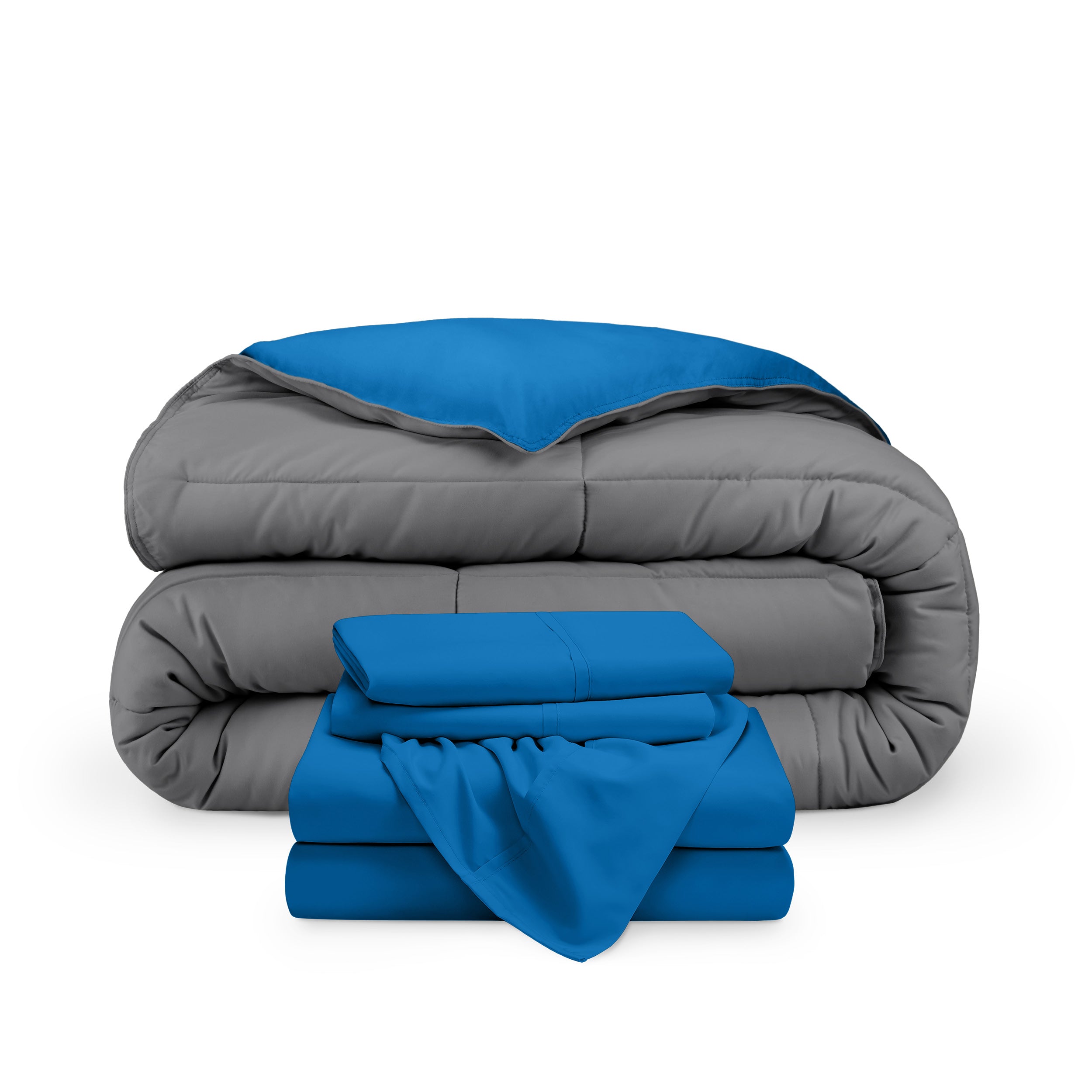 A reversible microfiber comforter and a coordinating sheet set folded and stacked