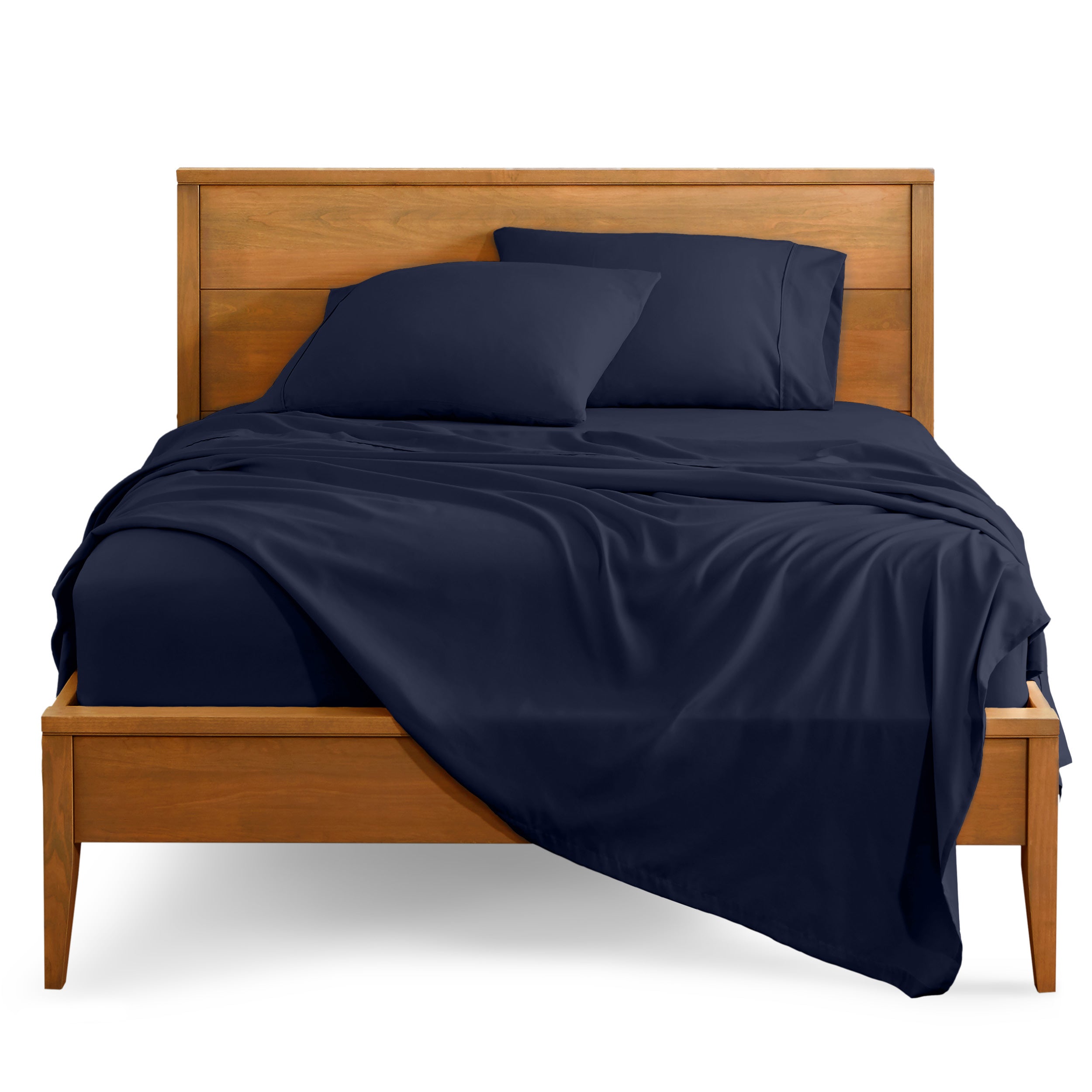 Microfiber sheet set on a bed with a wooden bed frame