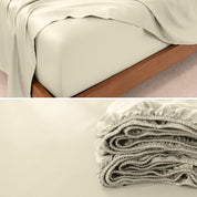 Close up view to show a TENCEL™ Lyocell sheets on a bed. The flat sheet is folded over itself.