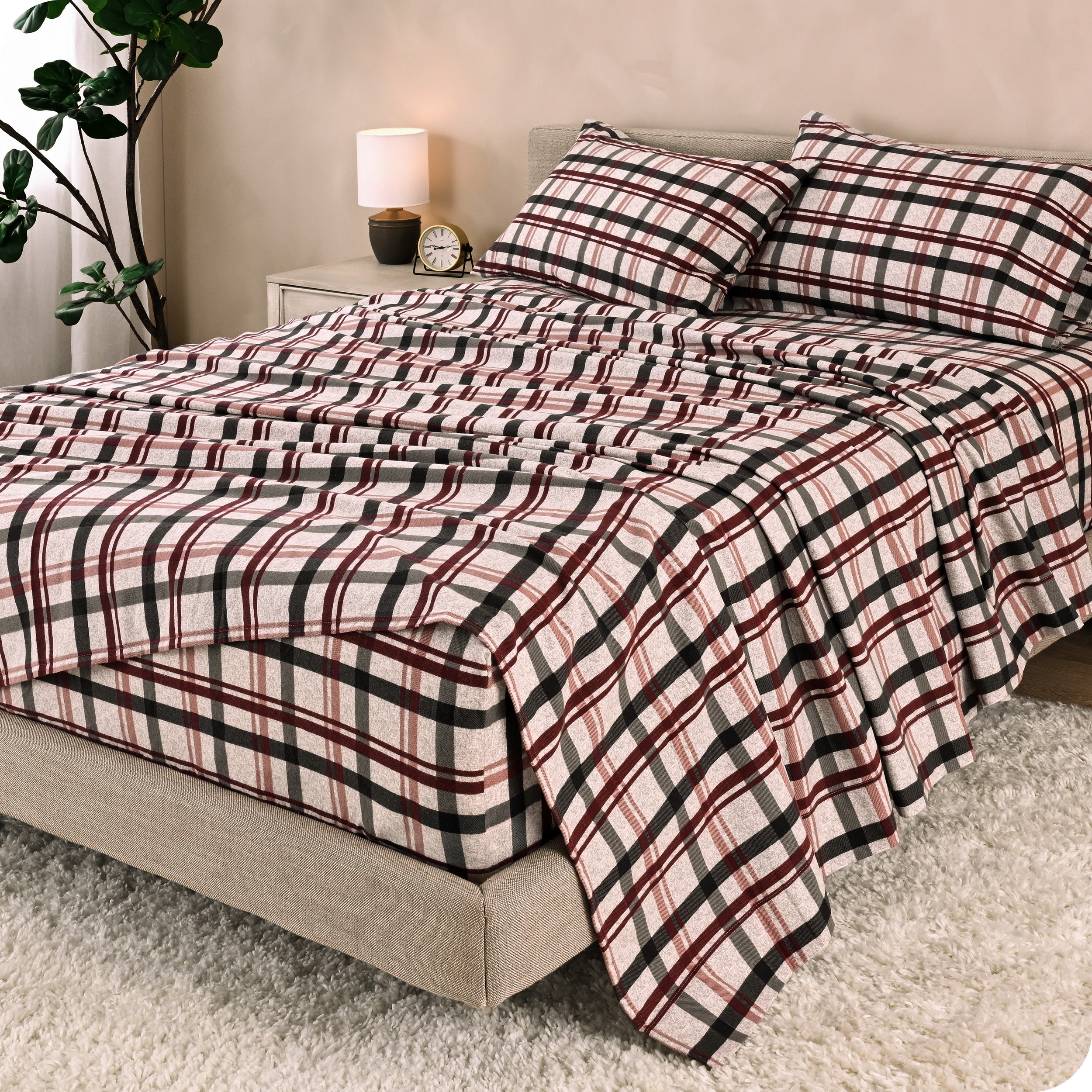 A bed made with cotton flannel sheets