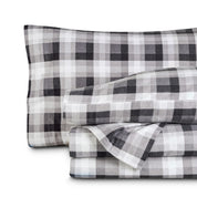 Printed flannel sheets folded and stacked