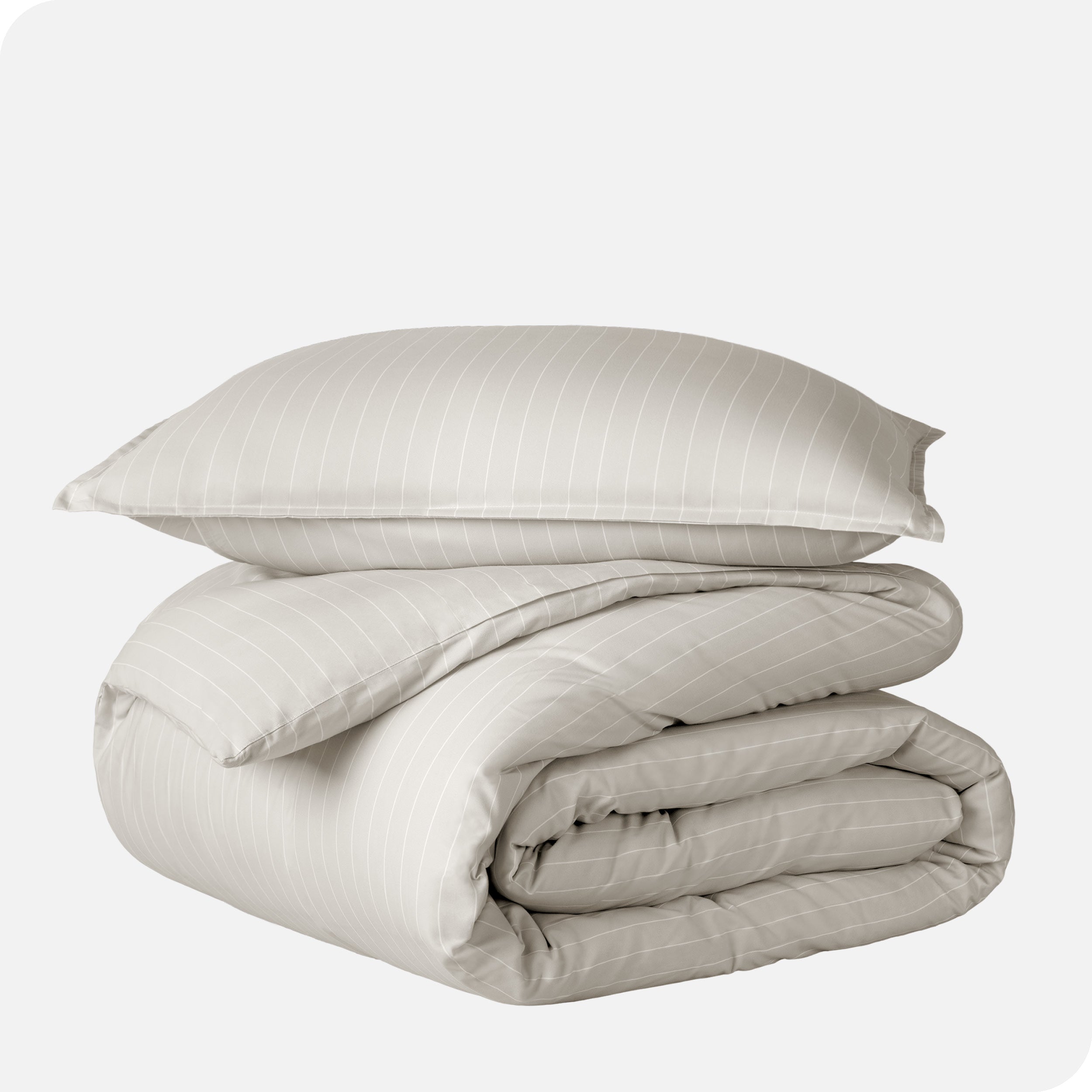A duvet cover set folded and stacked.
