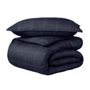 A duvet cover set folded and stacked.