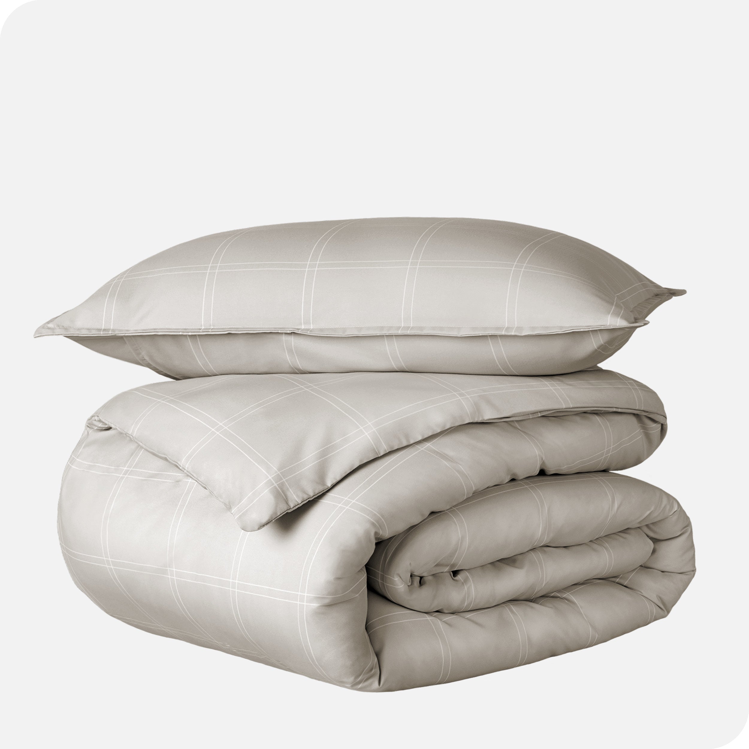 A duvet cover set folded and stacked.