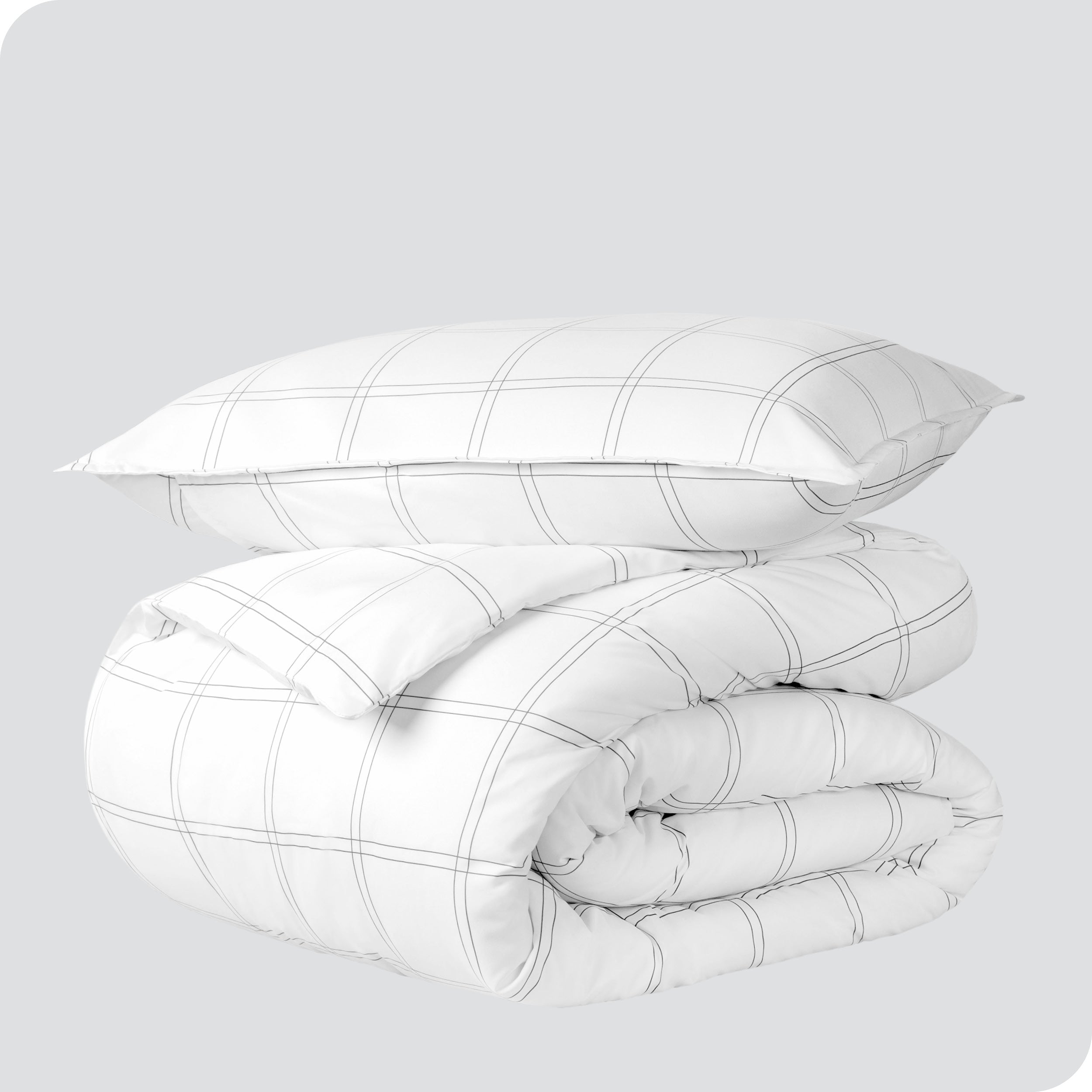 A duvet cover set folded and stacked.