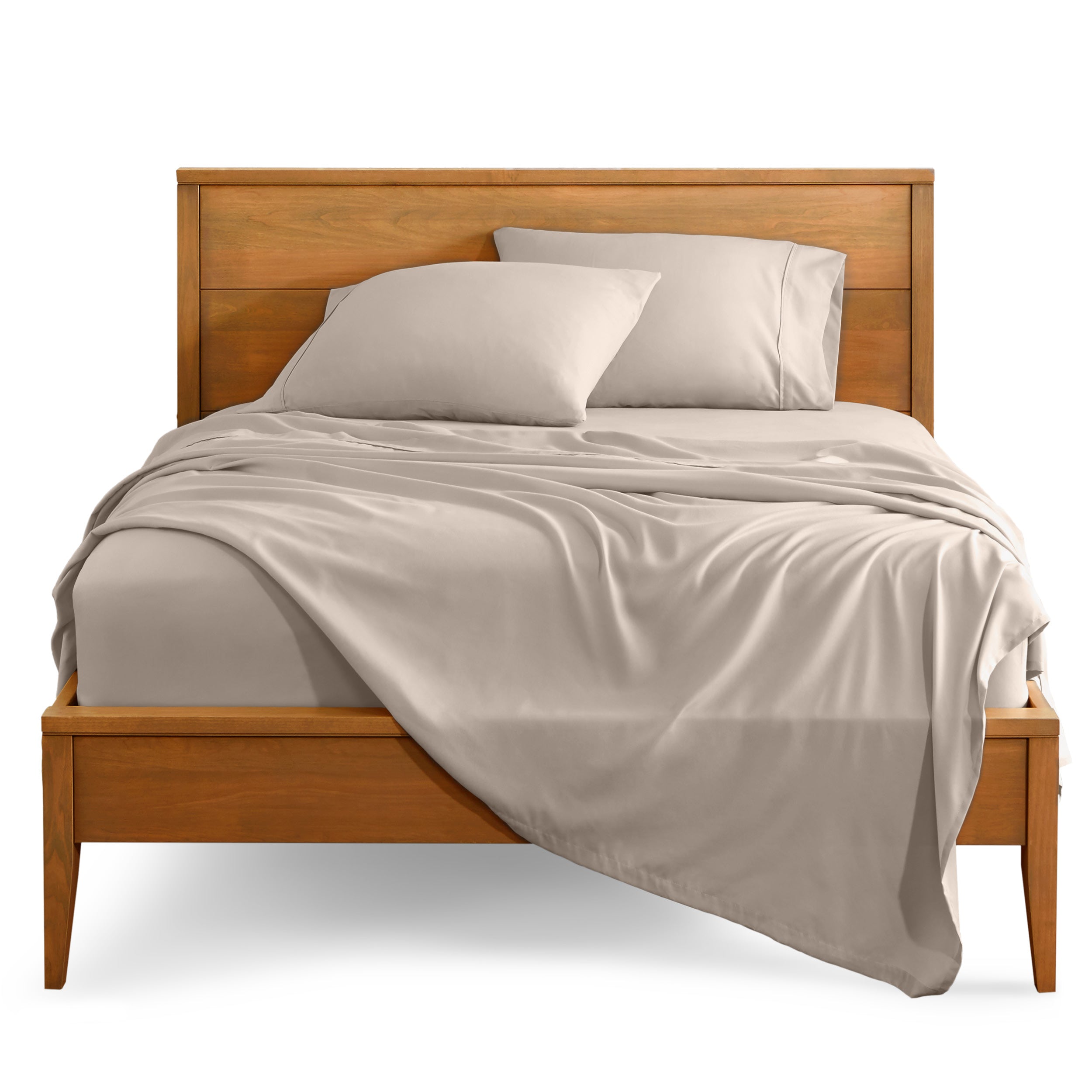 Microfiber sheet set on a bed with a wooden bed frame