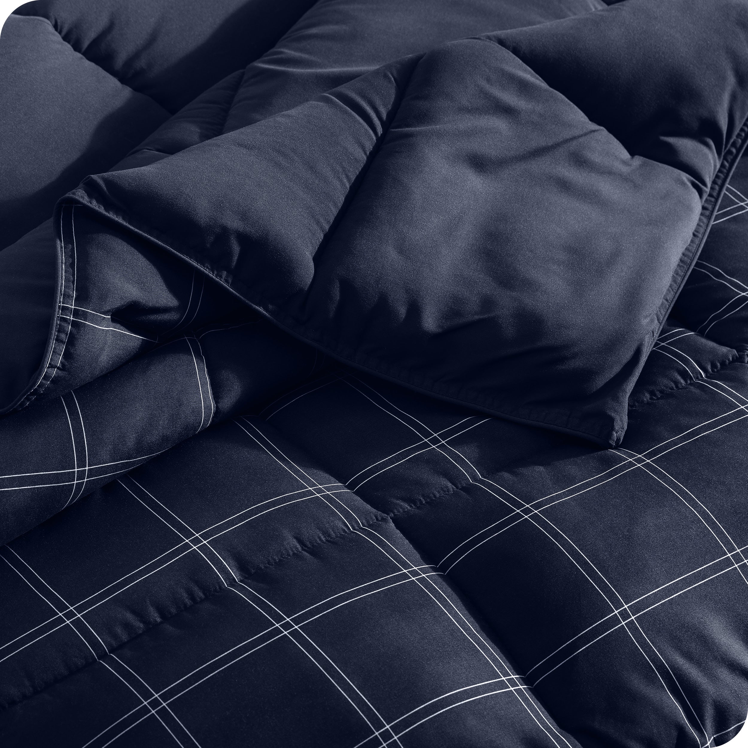 A close up of a corner of the microfiber comforter