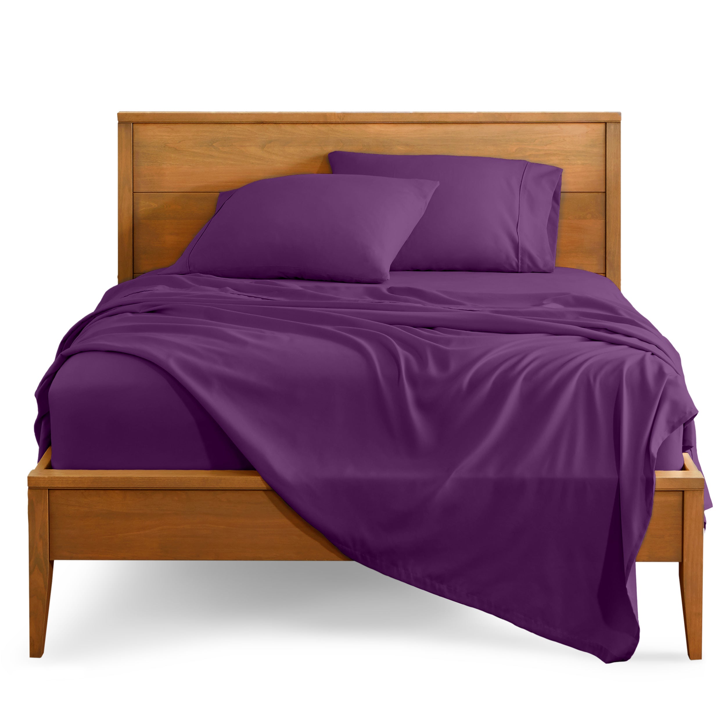Microfiber sheet set on a bed with a wooden bed frame