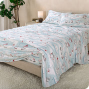 A bed made with cotton flannel sheets