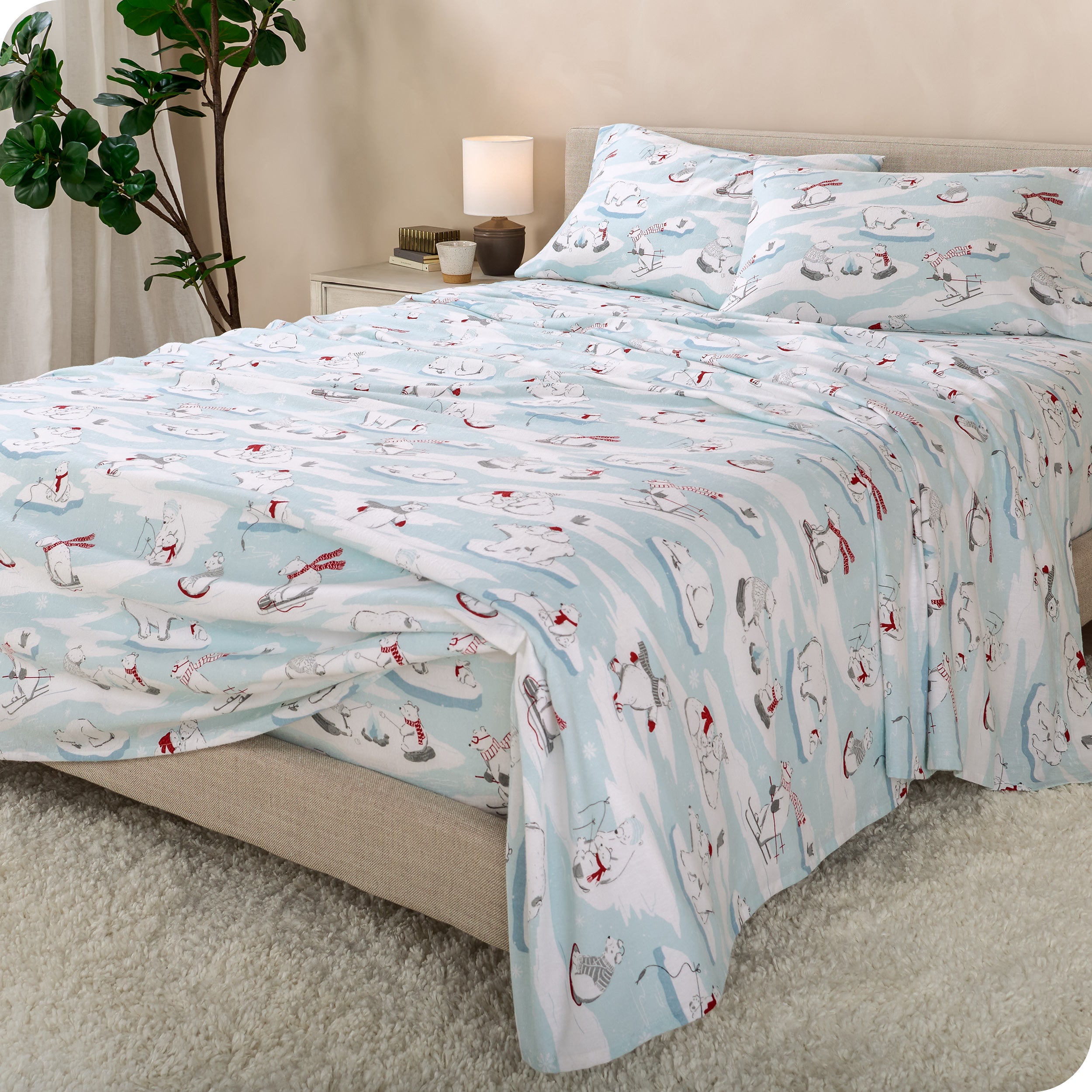 A bed made with cotton flannel sheets