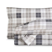 Printed flannel sheets folded and stacked