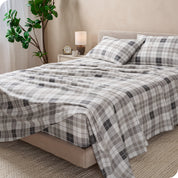 A bed made with cotton flannel sheets