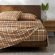 A bed made with cotton flannel sheets