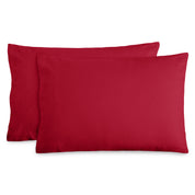2 pillows with flannel pillowcases on them